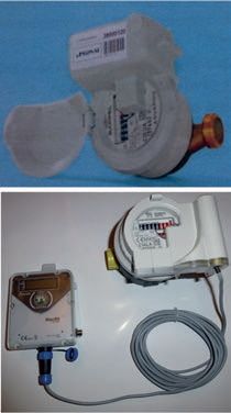 Pic. 2. View of exemplary modules: a) module installed next to the water meter, b) GSM module used for data transmission from water meters (wired)
